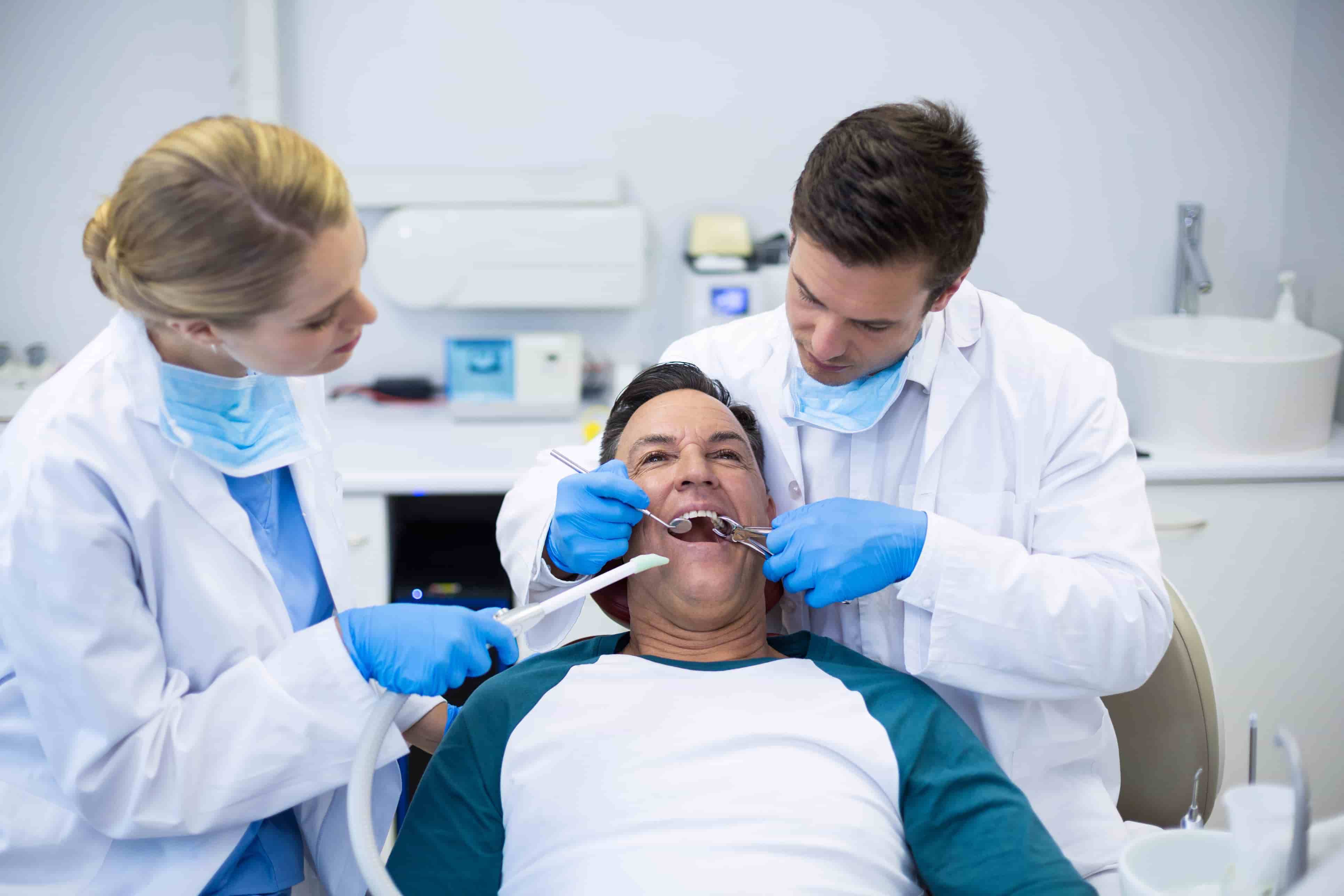 Dentist doing dental procedure